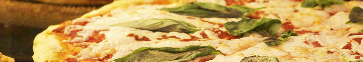 Eating Italian Pizza at Alberto's Italian Restaurant restaurant in Bennington, NH.